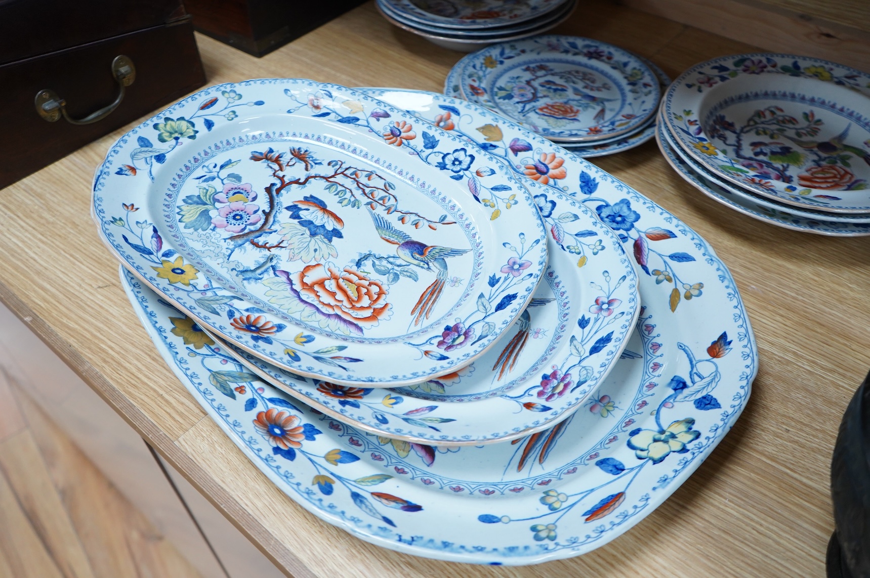 An early 19th century Davenport ironstone part dinner service, eight items, and four matching Stone China dessert dishes, meat plate 50cm
